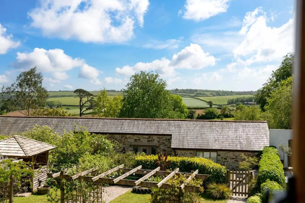 Image of Linhay at East Trenean Farm -Luxury retreat for 2 with stunning rural views, private hot tub and EV charging