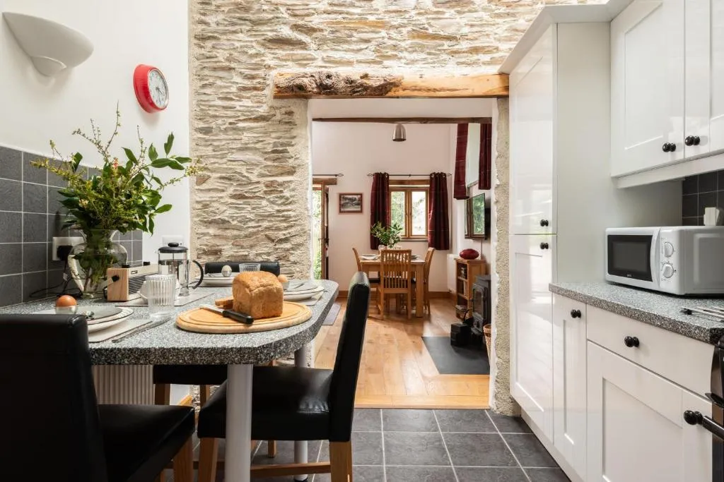 Image 1 of Water Mill at East Trenean Farm -Luxury Cornish Cottage sleeping 4 with hot tub, private garden, rural views and EV facilities