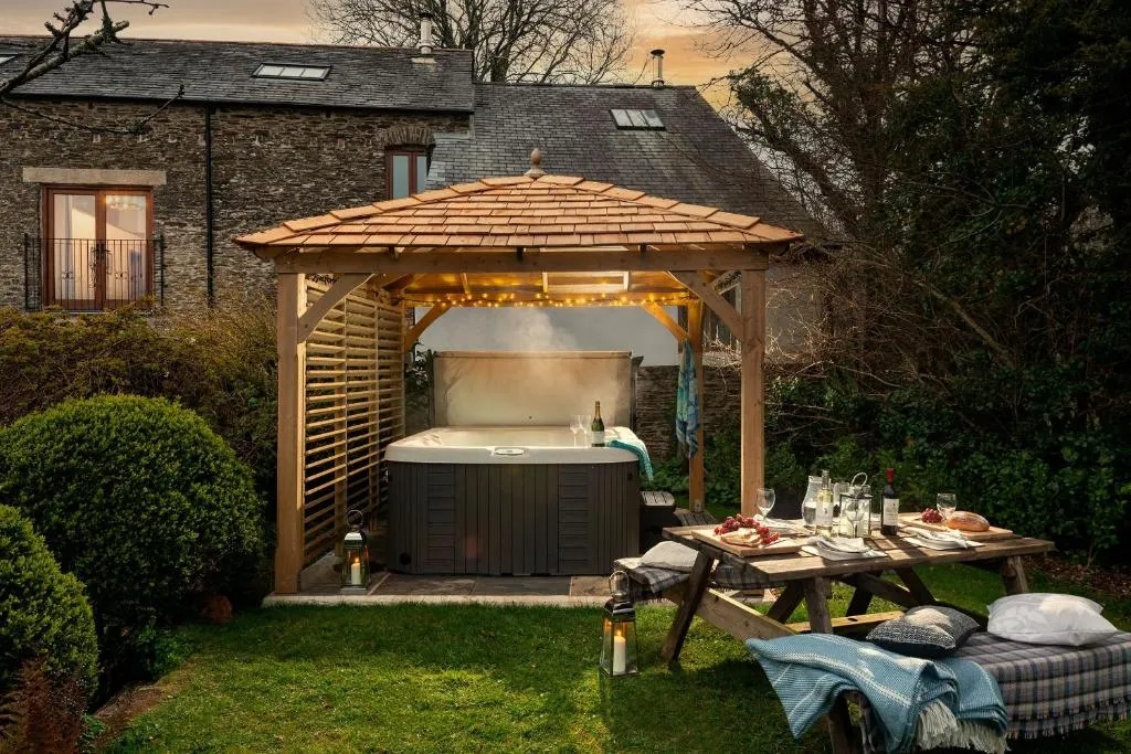 Image of Water Mill at East Trenean Farm -Luxury Cornish Cottage sleeping 4 with hot tub, private garden, rural views and EV facilities
