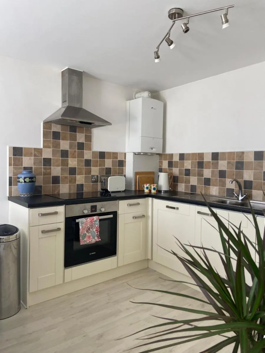 Image 3 of Above the Bay – Enclosed garden apartment with parking